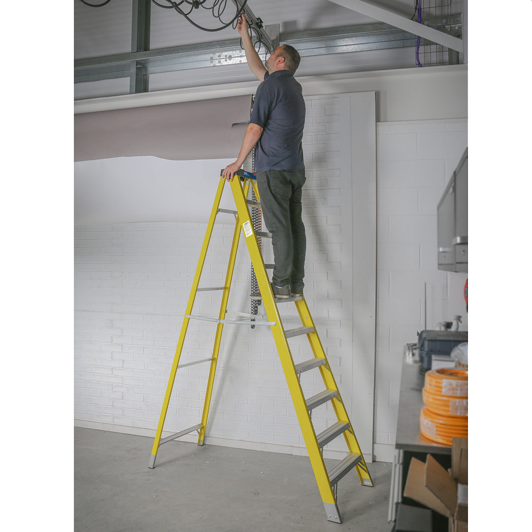 9 tread step ladder in use FSL10
