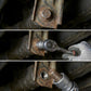 unscrewing rusty bolt with extractor